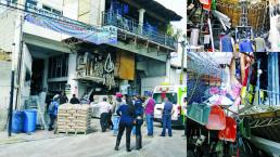 Derrumbe los deja varados en casa de materiales 