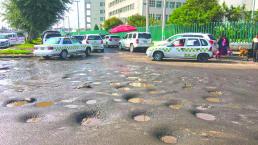 Baches inundados invaden zona de hospitales, en San Lorenzo Tepaltitlán