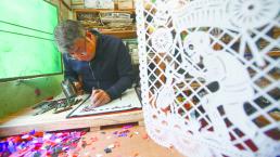 Defienden producción artesanal del papel picado