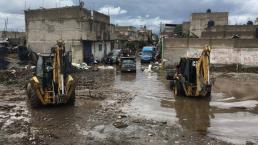 Calles inundadas de aguas negras por desbordamiento de canales en Chimalhuacán, Edomex