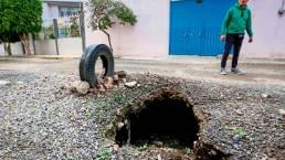 ¡Por fin baja el agua en Chalco!... Pero ahora aparecen tremendos socavones