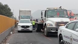 Tráiler impacta coche en la México-Puebla y muere prensada una mujer